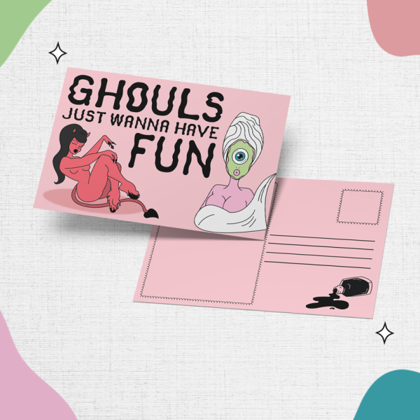 Two light pink postcards are shown. One side features an illustration of a lounging female ghoul and a cyclopes in a facemask and towel, with text reading "Ghouls Just Wanna Have Fun," while the other side is blank, providing areas for an address and message. The image is set against a backdrop of colorful abstract shapes.