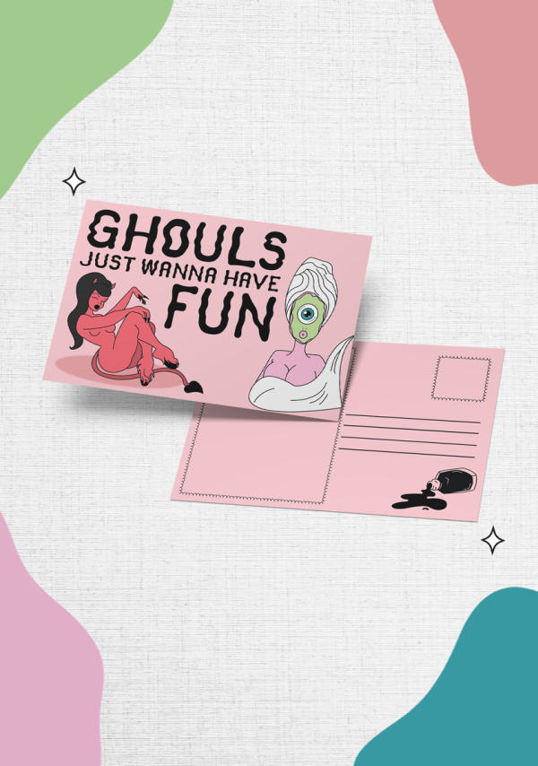 Two light pink postcards are shown. One side features an illustration of a lounging female ghoul and a cyclopes in a facemask and towel, with text reading "Ghouls Just Wanna Have Fun," while the other side is blank, providing areas for an address and message. The image is set against a backdrop of colorful abstract shapes.