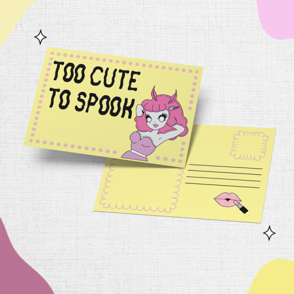 Introducing the Too Cute To Spook: a Halloween-themed postcard featuring a charming cartoon moth girl and the playful text "Too Cute to Spook." The front showcases the girl striking an adorable pose, while the back provides space for writing your message, along with a lipstick kiss mark and a postage stamp outline.