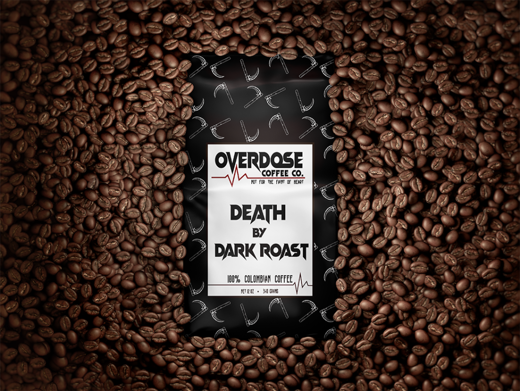 A bag of coffee labeled "Overdose Coffee Co." and "Death by Dark Roast" sits surrounded by a multitude of coffee beans. The label indicates it is 100% Colombian coffee with a net weight of 12 oz. The design features white and black colors with heartbeat lines.