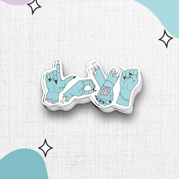 Introducing the "Zombie Love" sticker, which showcases four blue cartoon hands forming the letters L, O, V, and E in sign language. These hands have a Frankenstein-like appearance with visible stitches. The design is set against a white background adorned with teal and purple shapes and small black stars.