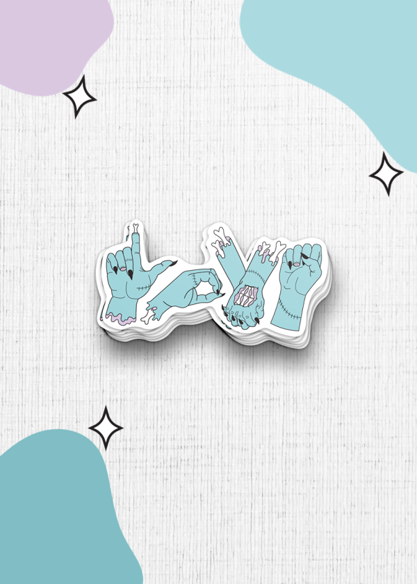 Introducing the "Zombie Love" sticker, which showcases four blue cartoon hands forming the letters L, O, V, and E in sign language. These hands have a Frankenstein-like appearance with visible stitches. The design is set against a white background adorned with teal and purple shapes and small black stars.