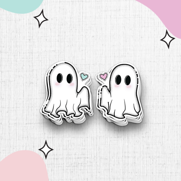 The "You're My Soulmate Sticker Duo" features two adorable ghost stickers with black eyes on a textured white background, each holding a small heart - one blue and one pink. Pastel-colored blobs and tiny sparkle designs decorate the corners, adding a charming touch.