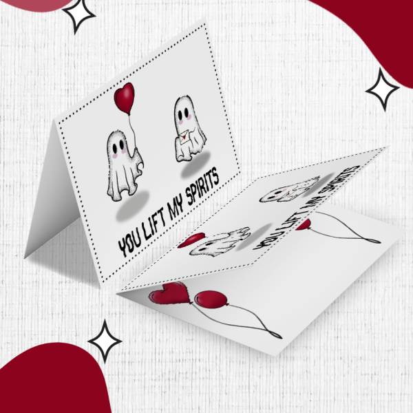 The Wish Boo Were Here Valentine’s Card is a 3D popup greeting card that features two cartoon ghosts holding heart-shaped balloons. The cover text at the bottom reads "YOU LIFT MY SPIRITS," with a background of white accompanied by red and maroon organic shapes and star accents.