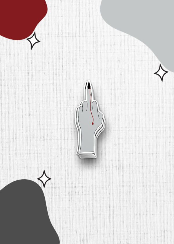 A sticker featuring a vampire hand making a rude gesture with the middle finger extended and a red blood dripping from the nail. The background showcases a textured white surface adorned with abstract shapes in red, gray, and black, along with small black star-like icons.