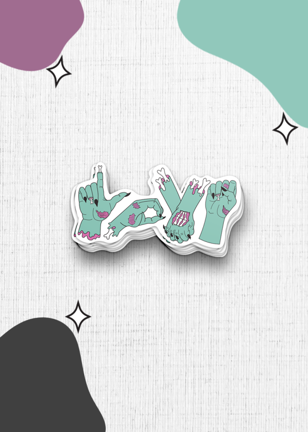 The Zombie Love sticker stack features the letters "LOVE" cleverly shaped by green zombie hands in various gestures. The backdrop showcases an array of abstract purple, green, and black shapes adorned with small black stars, creating a playful yet spooky atmosphere.